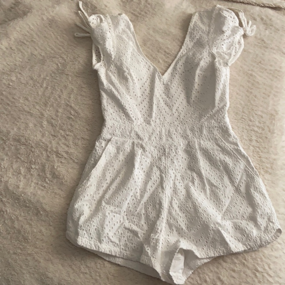 White gently worn romper